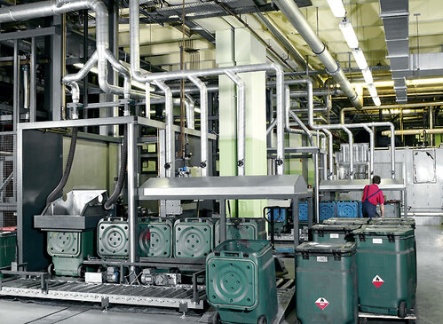 Vat tipping station with air exhaust system